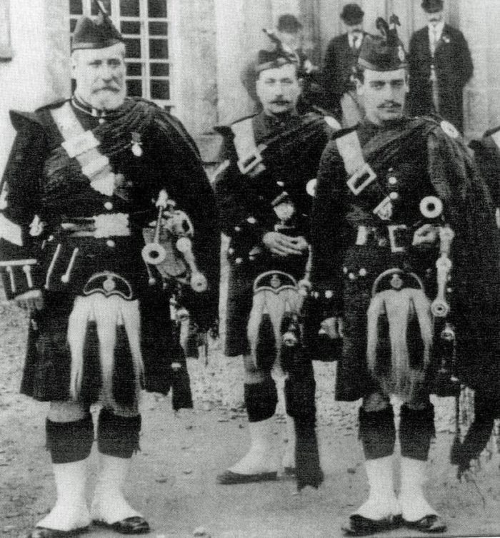 Pipe Major Duncan MacDougall (left), with sons John and Gavin (right) with the 2nd Perthshire Highland Rifle Volunteers in 1896.