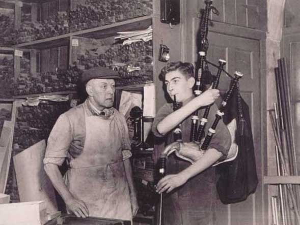 Glen in the shop with what is thought to be an apprentice in the early 1900s.