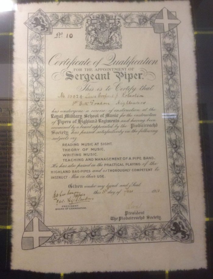 Robertson's Pipe Major's Certificate from the Army School of Piping hangs in the band hall of the Turriff and District Pipe Band.