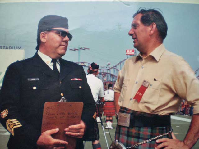 Well known Ontario piper, Major Archie Cairns, may have been John MacLellan's closest friend. Here, they share a moment while judging at the Scottish World Festival Tattoo at the CNE grounds in Toronto in 1972.
