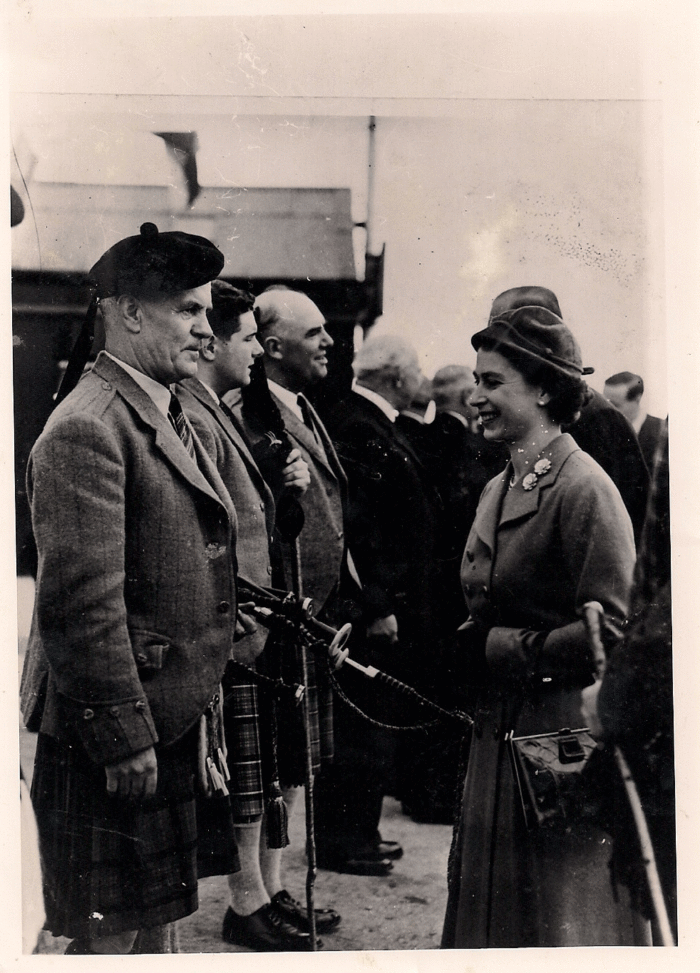 With Queen Elizabeth in the 1950s.
